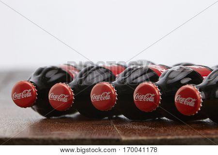 Kuala Lumpur, Malaysia 12th December 2016,coca cola soft drink on wooden table top