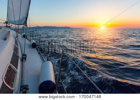 Sailing ship boats in the Sea during amazing sunset. Luxury yachts.