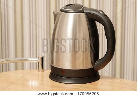 Electric kettle on a table