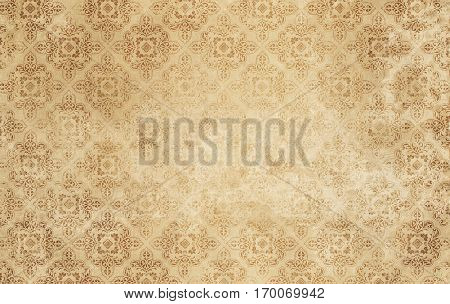 Old dirty paper background with old-fashioned patterns. Old wallpaper background for the design.