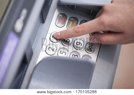 Female arms, ATM - entering pin 