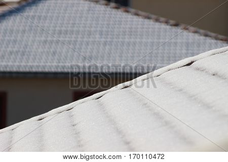 snow detail light reflection winter sun cold roof
