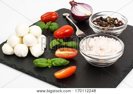 Mini mozzarella balls on white. Studio Photo