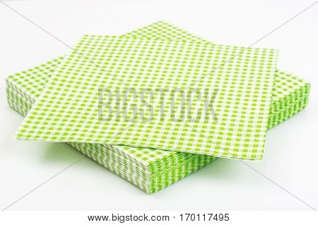 Paper disposable napkins Serving on white. Studio Photo