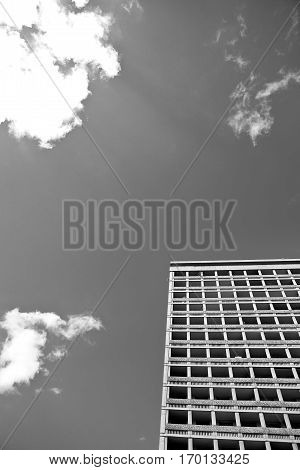Bllack and white modern office or residential buildings with blue sky, and clouds Lyon France
