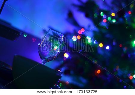 Empty Askew Wine Glass And Abstact Night Blury Defocus Bokeh Light Background Photography