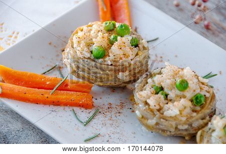 Cooked Artichokes  With Rice, Green Peas, Carrot And Olive Oil. Turkish Dish - Zeytinyağlı Enginar.
