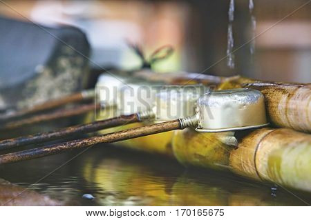 Japan, Nara, Kofuku-ji Temple, Row of ladles, close-up