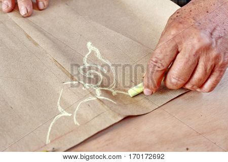 Folk Artisan Draw Lines For Being Original Carved Wood.