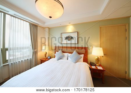SEOUL - NOV 2, 2015: Bedroom with dounle bed in hotel Fraser Insadong