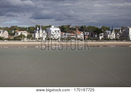 View of the coastline with seaside resort of Royan with grey tourmented sky France