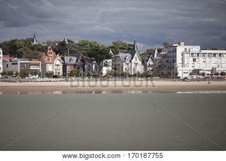 View of the coastline with seaside resort of Royan with grey tourmented sky France