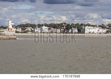 View of the coastline with seaside resort of Royan with grey tourmented sky France