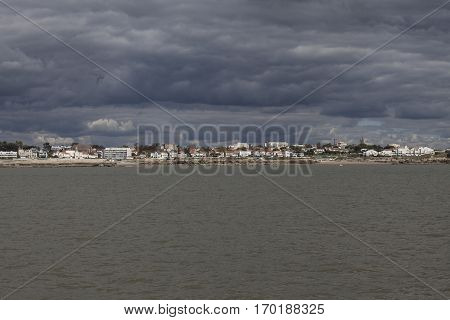 View of the coastline with seaside resort of Royan with grey tourmented sky France