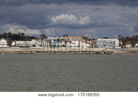 View of the coastline with seaside resort of Royan with grey tourmented sky France