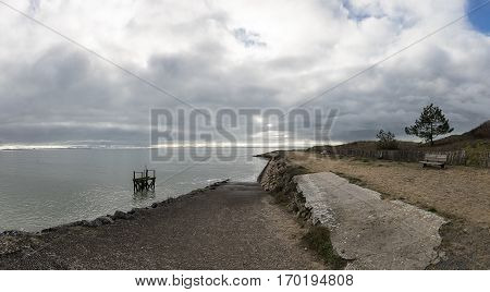 Panoramic view of the coastline and dike proctecting the village of l'Aiguillon sur Mer Vendee France
