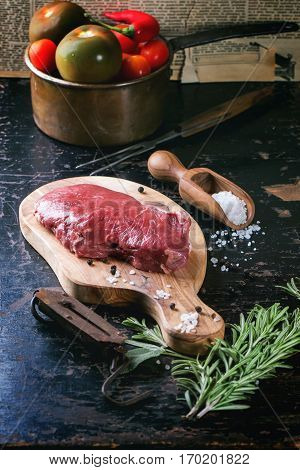 Raw Steak With Herbs And Pepper