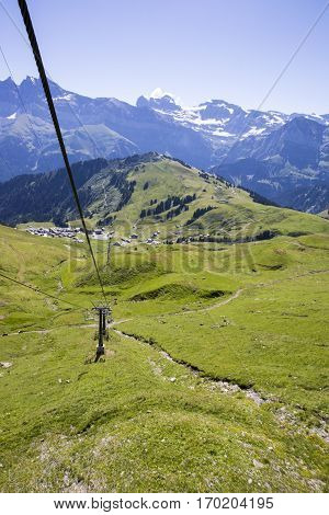 alpine landscape in summer viewed from the chair lift Alps mountain massif Cantons Vaud and Valais Swiss Alps Switzerland