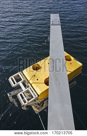 Scientific submarine robot with crane ready to be submerged. Research