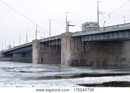 Volodarsky Bridge in St.Petersburg at cloud winter day Russia.