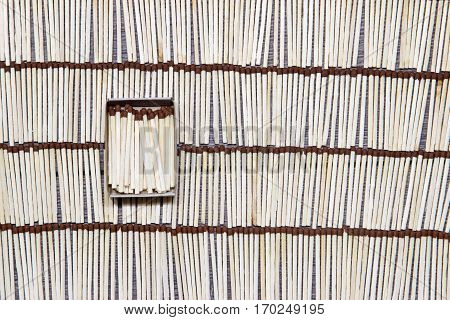 Matches rows folded. Background from matches. abstract.