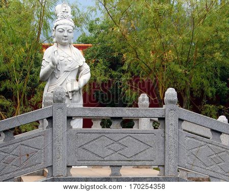 White marble Guanyin statue on the bridge in Nanyue Damiao temple Heng Shan Hunan China