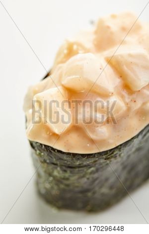 Japanese Sushi - Ika Gunkan Sushi (Nori wrapped Scallop Sushi) on White Background