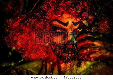 Evil clown murderer stained in blood. Female zombie clown. Halloween. Horror.