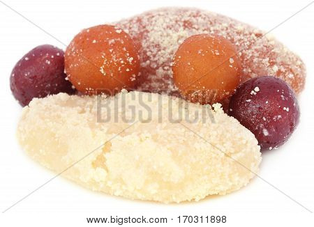 Popular Bangladeshi indian Sweetmeats over white background