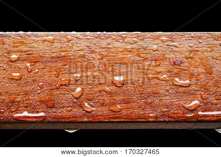Drop of water on wood with raindrop after a rain with copy space.