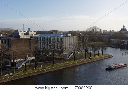 AMSTERDAM, NETHERLANDS - JANUARY 2, 2017: View to island Kattenburg. Historically this island was occupied by shipbuilders, and now it houses the Maritim History Museum