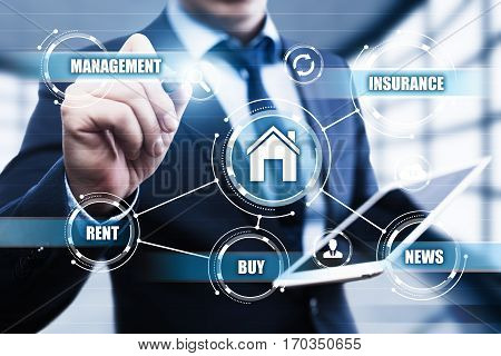 businessman pressing button on virtual screens in modern office