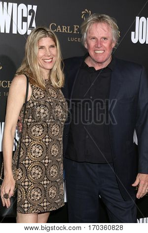 LOS ANGELES - JAN 30:  Steffanie Sampson, Gary Busey at the 