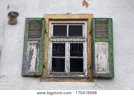 Window / Old window with shutters closed