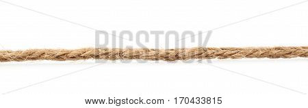 Line of a twisted decorational linen rope string isolated over the white background