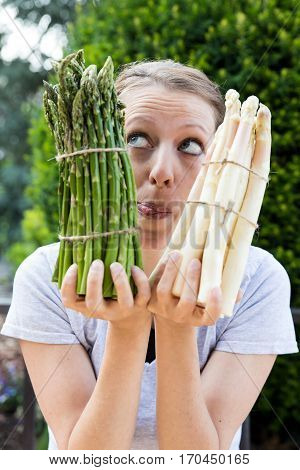 Woman With Green And White Asparagus
