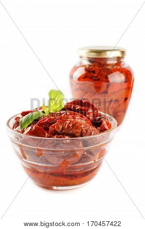 Italian appetizer - sundried tomato in bowl and glass jar.