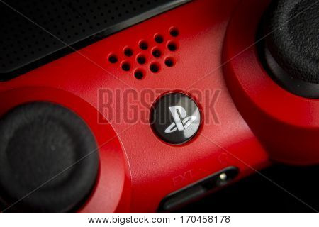 VALENCIA, SPAIN - FEBRUARY 3: Close up macro view from Dualshock 4 wireless controller for playstation 4 magma red on February 3, 2017 in Valencia, Spain