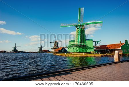 Traditional Dutch windmills from the channel Rotterdam. Holland.