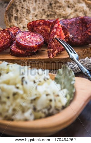 Farmer's Breakfast. Sausage Sour Cabbage and Bread. Raw Ingredients.