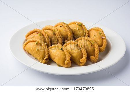 Gujiya - sweet dumplings made during the festival of holi and diwali, selective focus