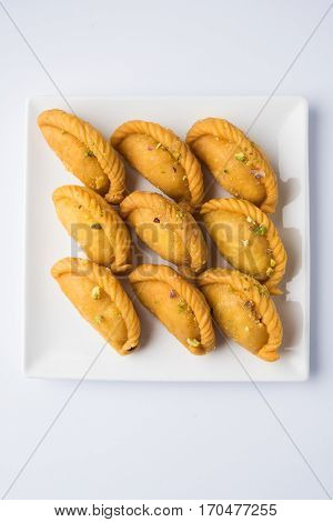 Gujiya - sweet dumplings made during the festival of holi and diwali, selective focus