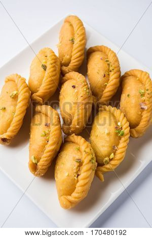 Gujiya - sweet dumplings made during the festival of holi and diwali, selective focus