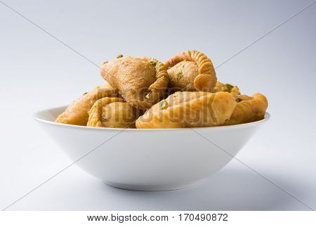 Gujiya - sweet dumplings made during the festival of holi and diwali, selective focus