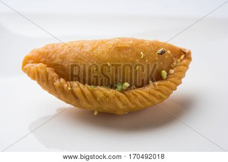 Gujiya - sweet dumplings made during the festival of holi and diwali, selective focus