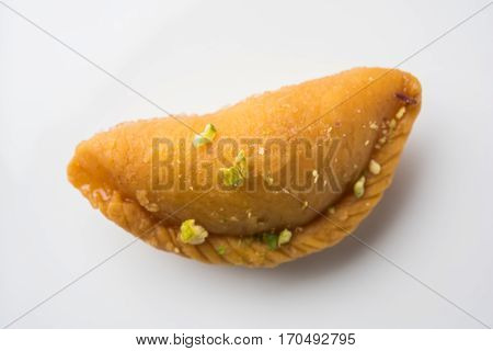 Gujiya - sweet dumplings made during the festival of holi and diwali, selective focus