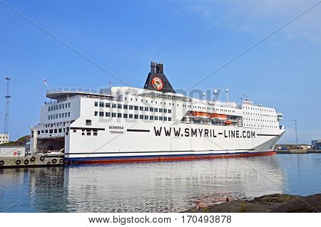 Torshavn, Faroe Islands - June 5, 2014: The ferry ship Norrona from Smyril Line has moored at the ferry terminal in Torshavn.