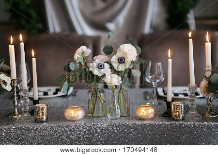 Wedding , festive decor. Bouquet from spring flowers. Table layout. Table of newly married. Restaurant interior.