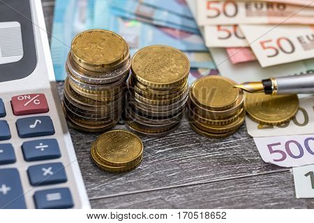 calculator with euro cins and banknotes. macro.