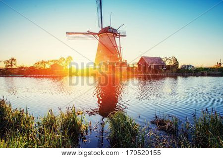Traditional Dutch windmills from the channel Rotterdam. Holland.
